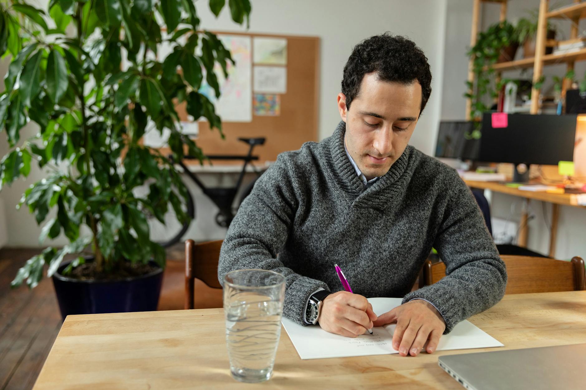Man working comfortably at a home office desk