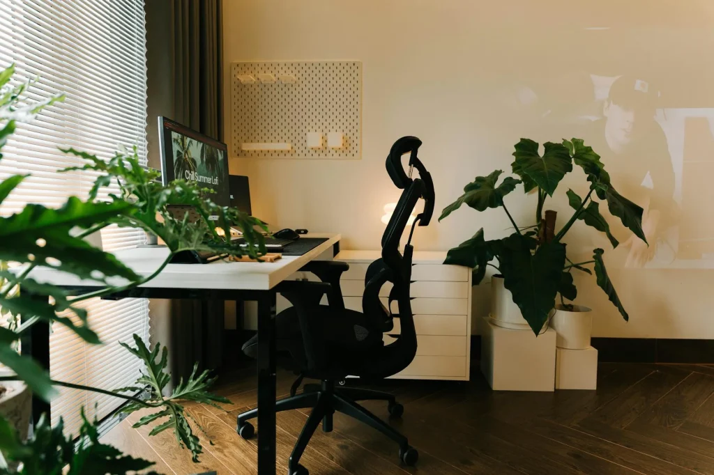 Ergonomic mesh office chair at a modern home office desk