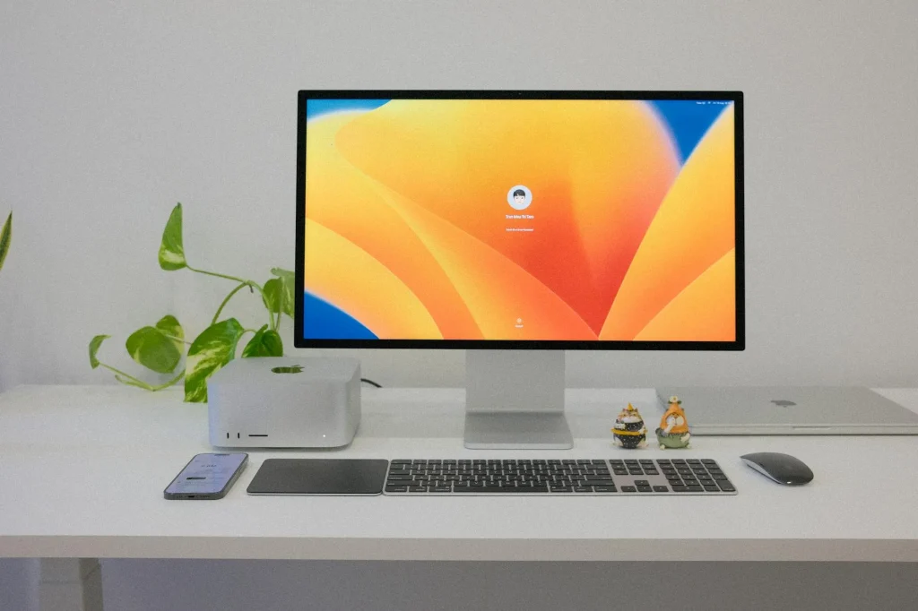 White minimalist desk setup in a home office