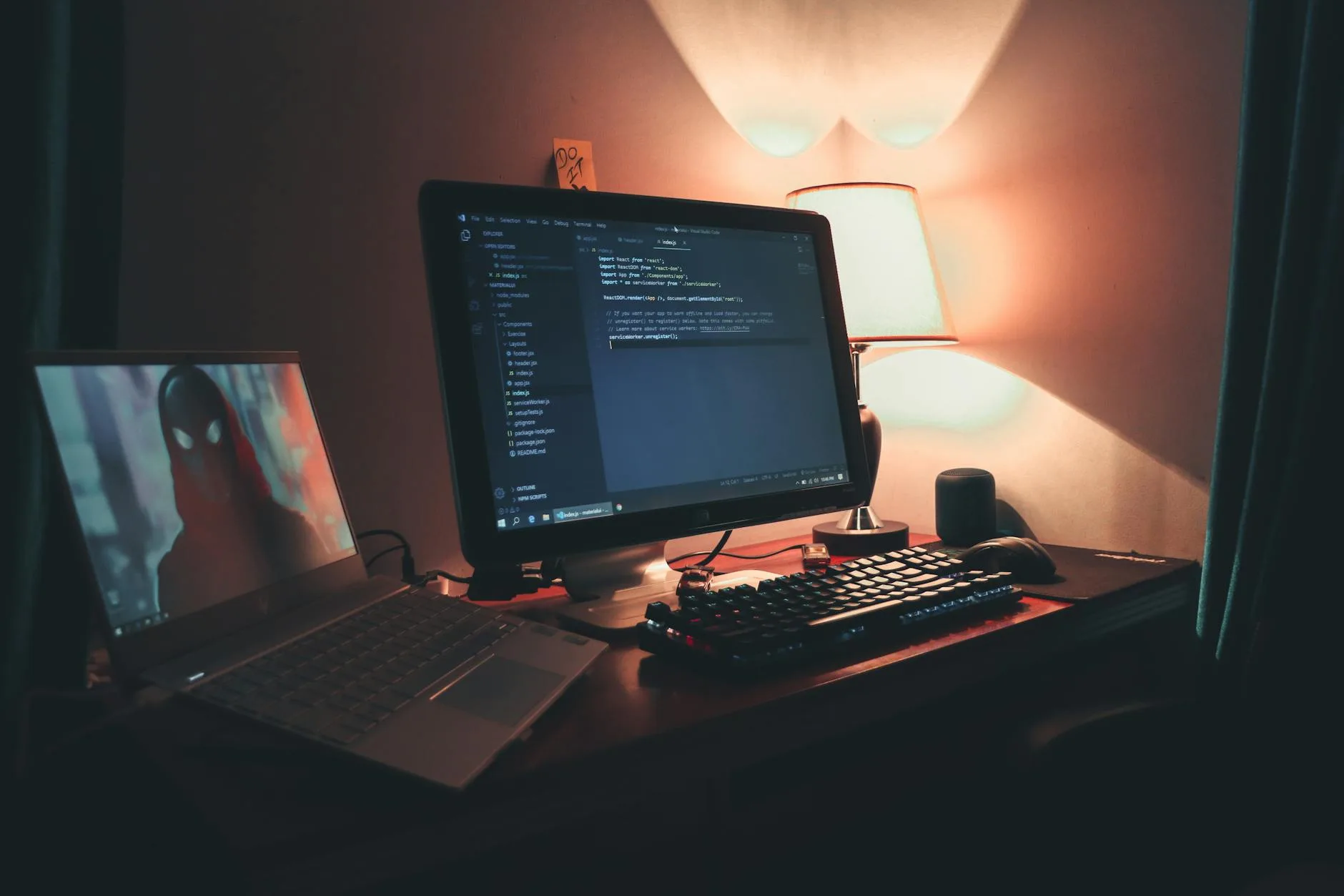 Warm desk lamp illuminating a workspace in the evening