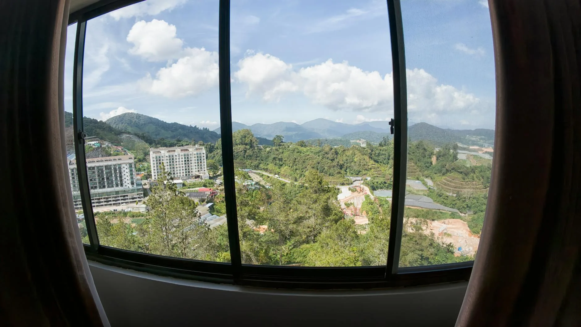 View through an office window showing natural daylight