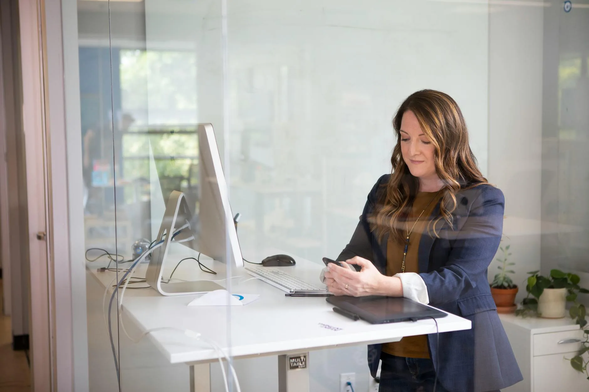 Person working at a standing desk in the elevated position