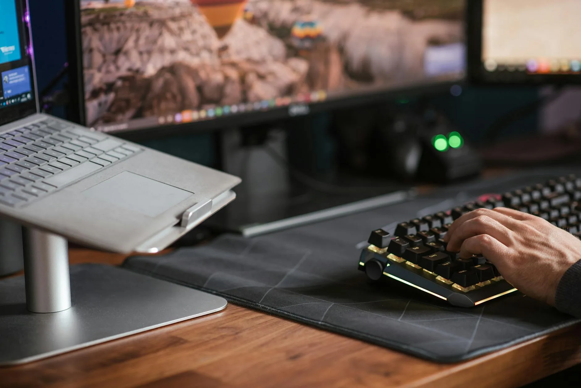 Person typing at a standing desk testing stability