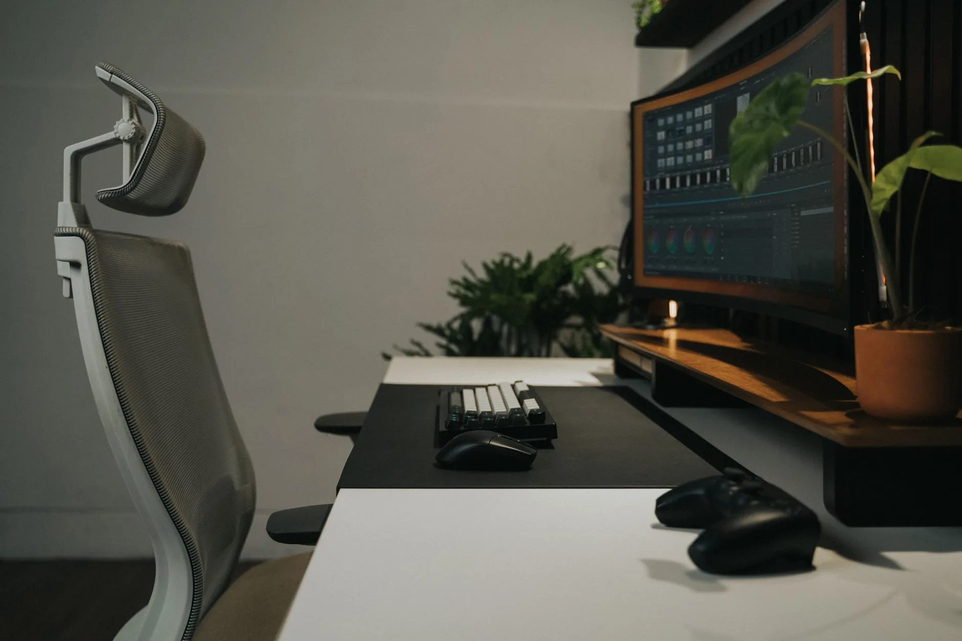Ergonomic home office setup with chair monitor keyboard and mouse