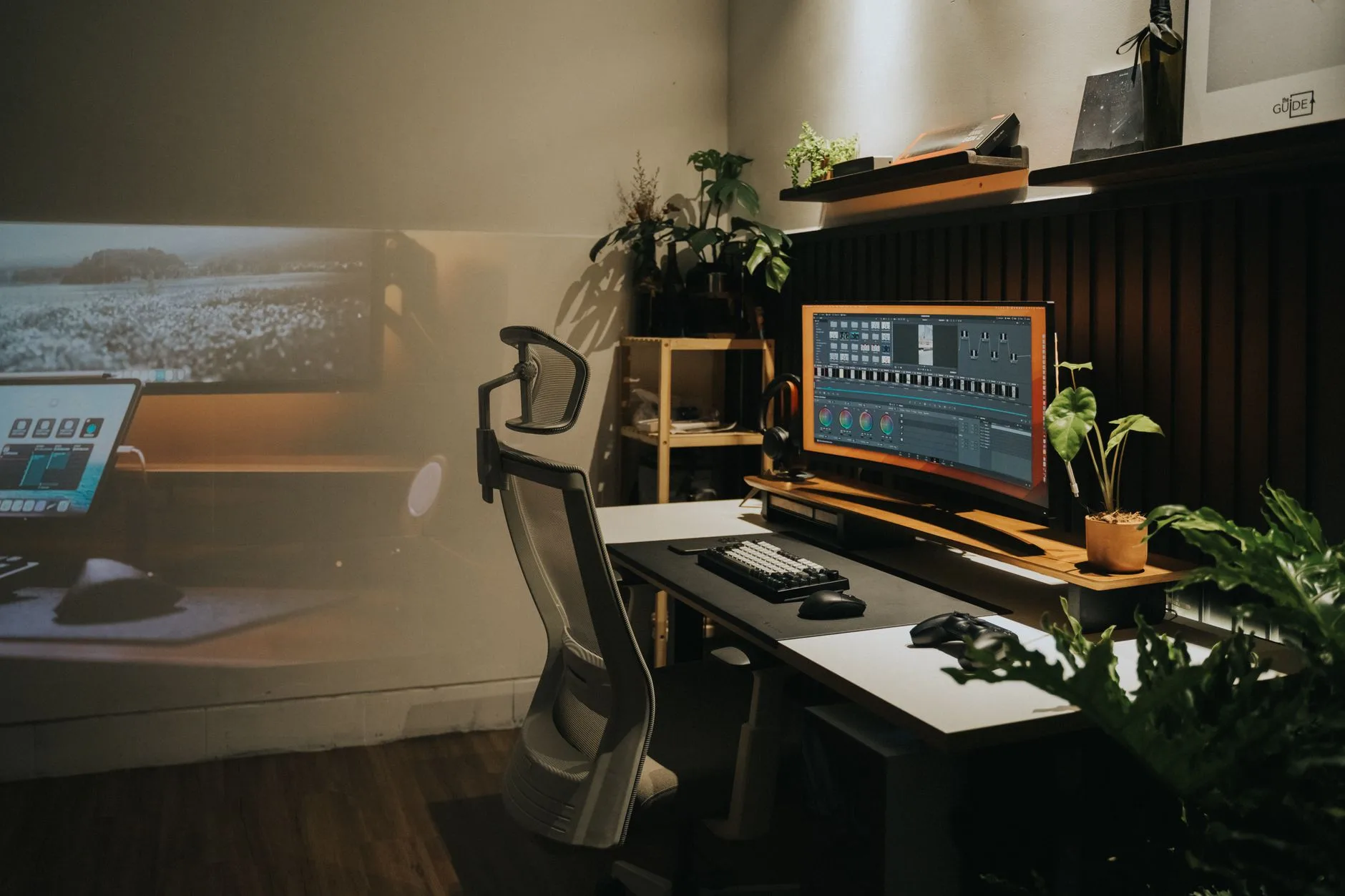 Curved monitor on an ergonomic desk setup for documents