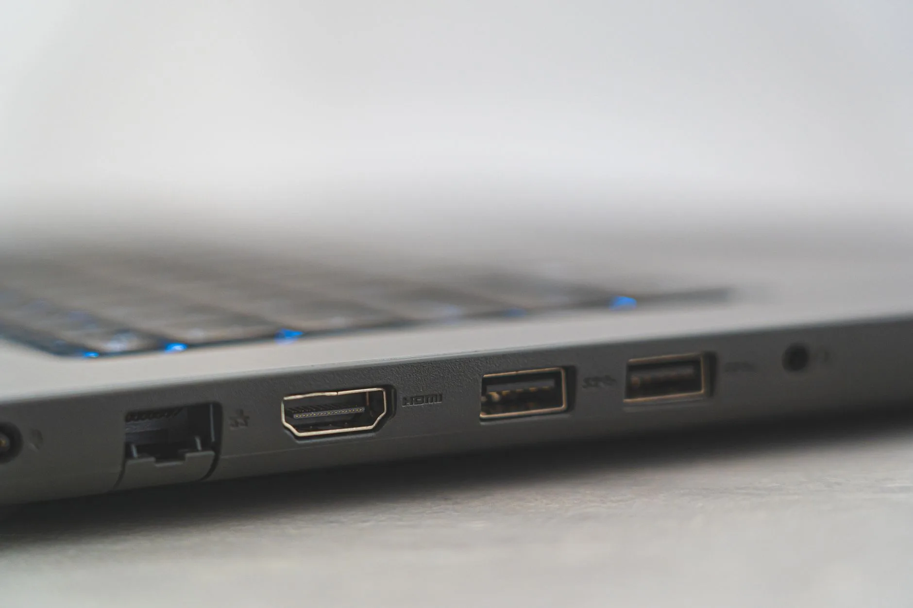HDMI cable connected to a monitor on a home desk