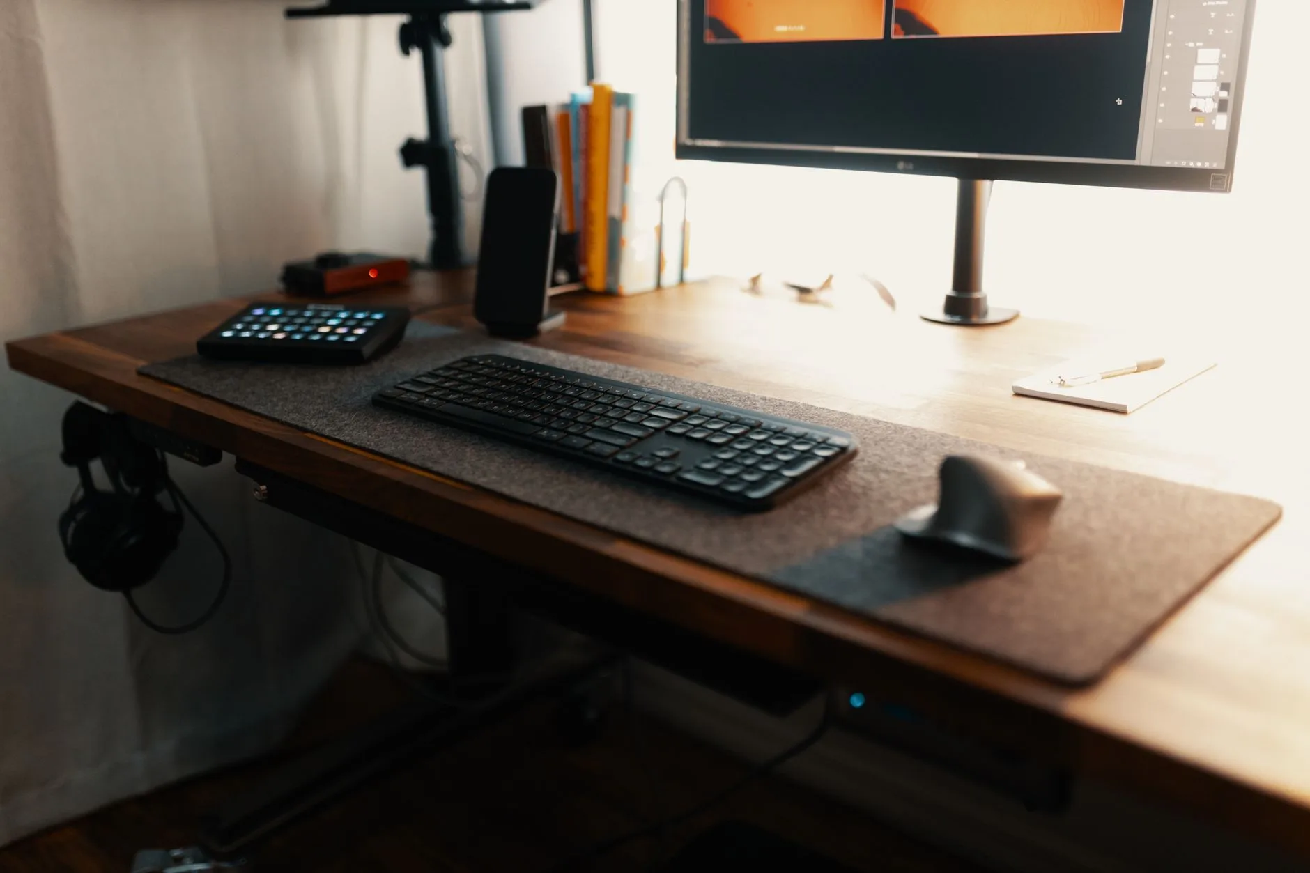 Monitor and keyboard setup on a deep office desk