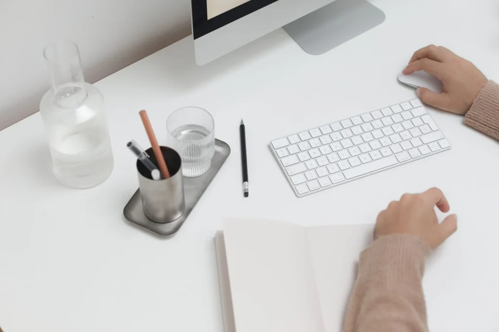 White office desk setup for an IKEA Bekant desk review UK