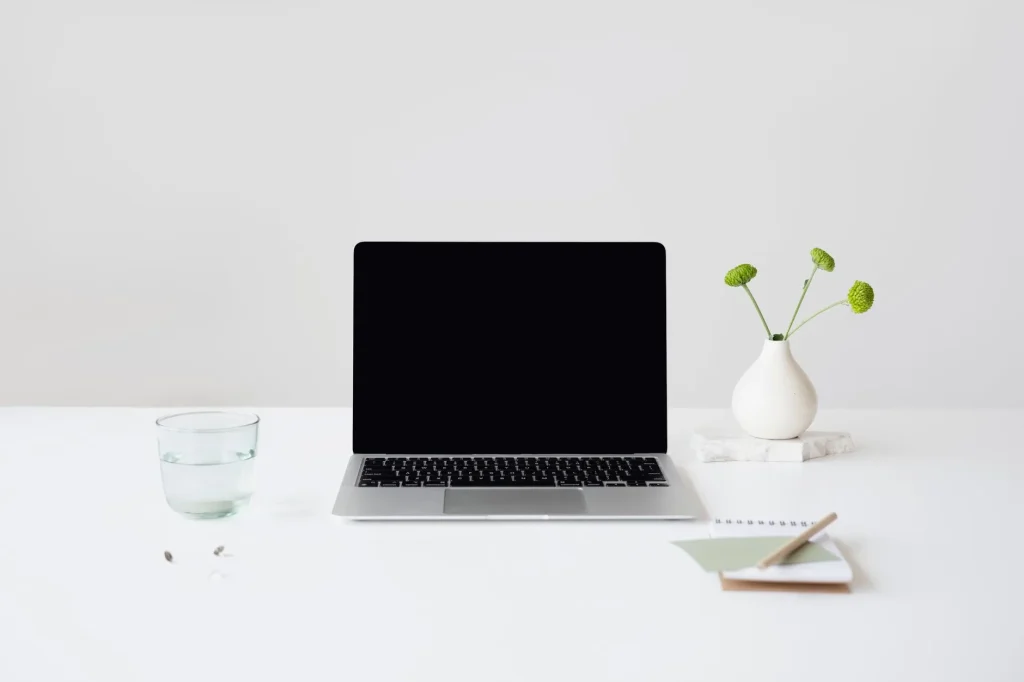 Tidy home office desk showing simple ways to reduce desk clutter