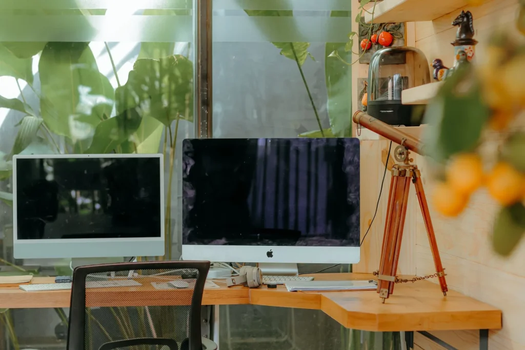 Wide desk with two monitors in a home office
